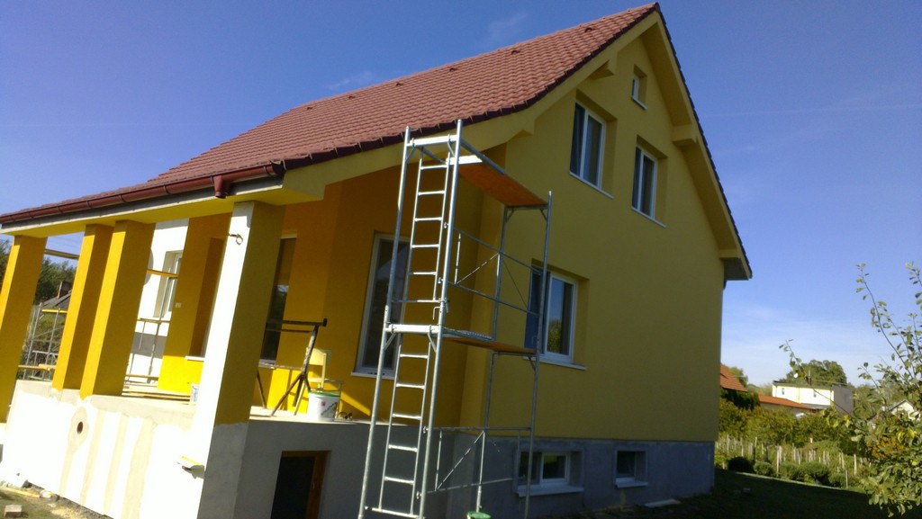Stavebná spoločnosť QUATTRO-H - práce na fasáde rodinného domu