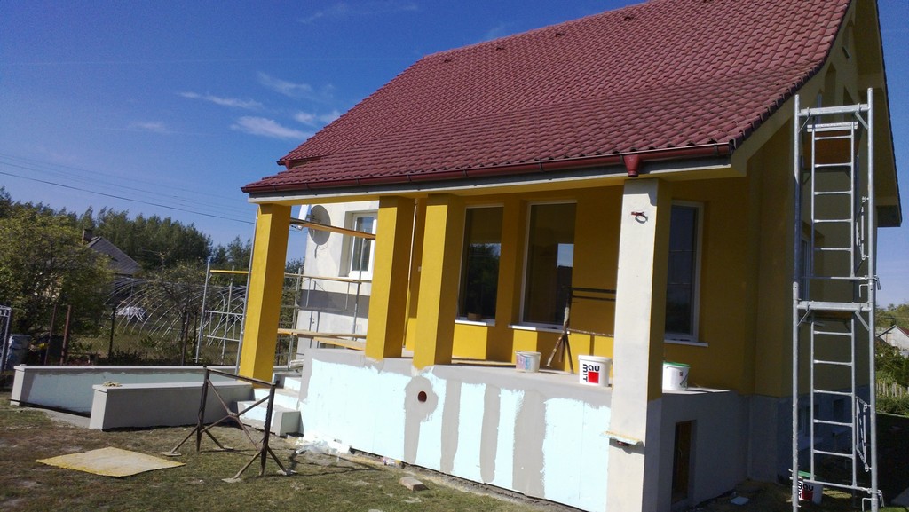 Stavebná spoločnosť QUATTRO-H - práce na fasáde rodinného domu